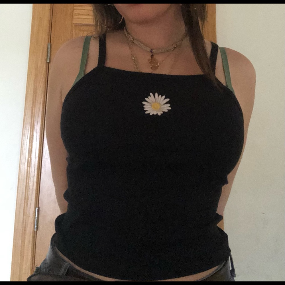 Black tank top with little daisy in the middle crop top
